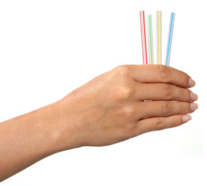 hand holding straws