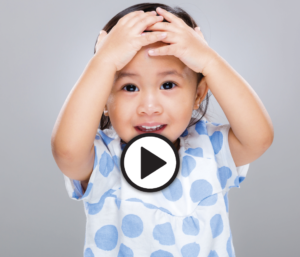 child with hands on head_video