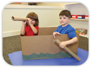 children in make-believe row boat