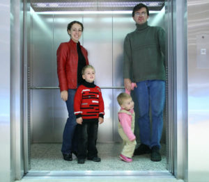 family in elevator