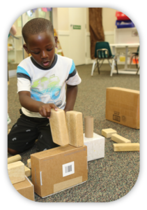boy building with blocks