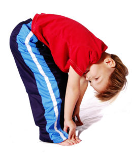 boy bending and touching his toes