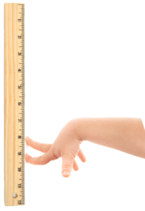 childs fingers crawling up a ruler like a spider