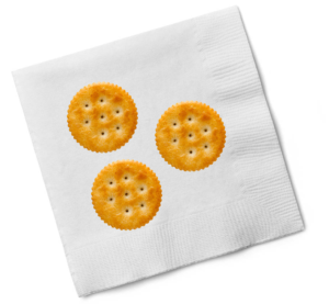 A napkin with 3 crackers
